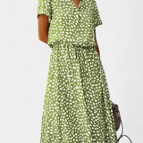 Rovena Vestido Midi de Lunares con Cuello Camisero y Cintura Ajustable