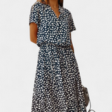 Rovena Vestido Midi de Lunares con Cuello Camisero y Cintura Ajustable